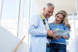 Mature couple reading map