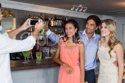 Man taking a picture of his friends