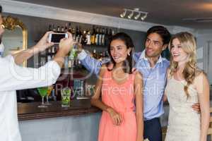 Man taking a picture of his friends