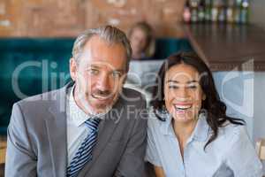 Business colleague smiling in restaurant
