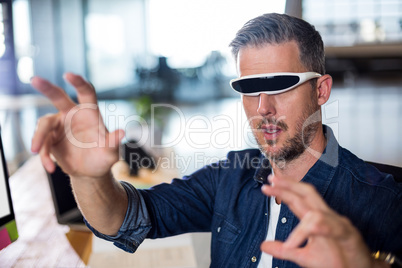 Man wearing virtual glass in office
