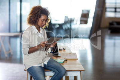 Woman using digital tablet