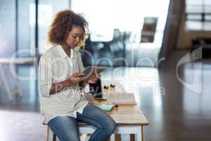 Woman using digital tablet