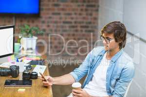 Man using mobile phone in office