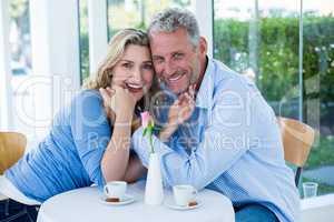 Portrait of romantic couple in restaurant