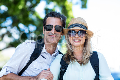 Happy couple wearing sunglasses