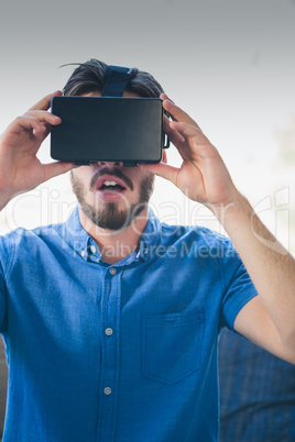 Close-up of man using virtual reality glasses