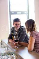 Young man with girlfriend at counter