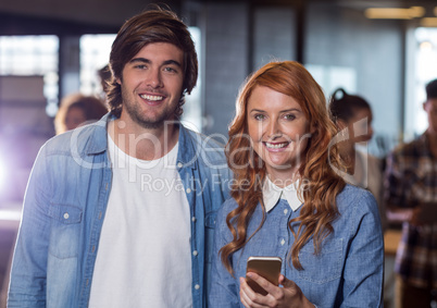 Portrait of happy colleagues in office