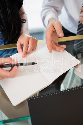 Businessman discussing with colleague