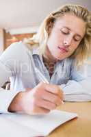 Man writing on a book