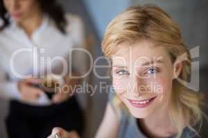 Beautiful woman smiling in cafÃ©