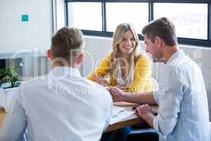 Business people smiling in office