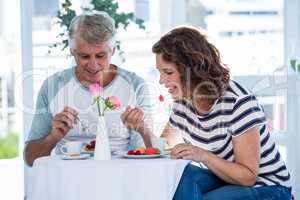 Couple eating food at restaurant