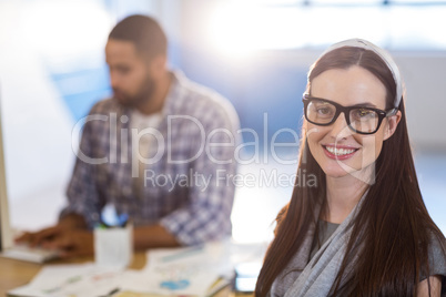 Businesswoman with colleague in office