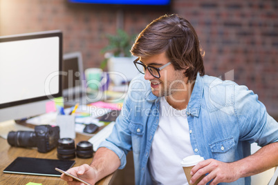 Man using mobile phone in office