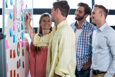 Businessman discussing with colleagues