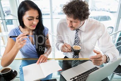 Businessman discussing with colleague
