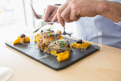 Close-up of man having meal