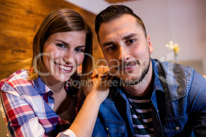 Portrait of happy couple at bar