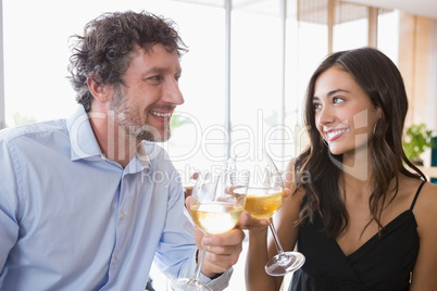 Couple toasting glasses of champagne