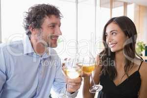 Couple toasting glasses of champagne