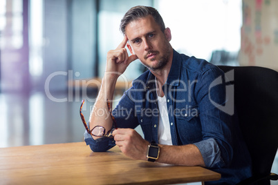 Portrait of thoughtful man in office Portrait of thoughtful man in office
