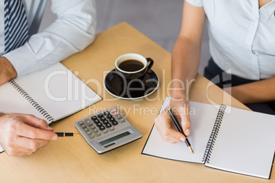 Man and woman meeting over coffee