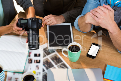 Business people working at table in creative office