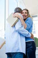 Happy woman with man on steps