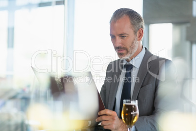 Businessman looking at menu