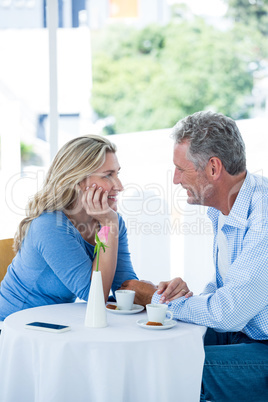 Romantic mature couple at restaurant