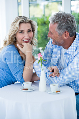 Romantic couple sitting in restaurant