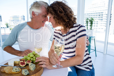 Romantic couple sitting at restaurant