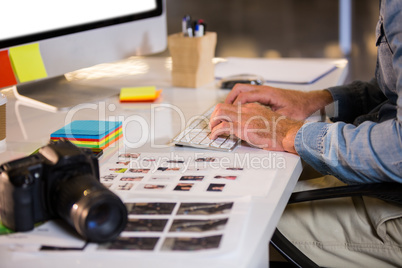 Businessman working on computer at desk