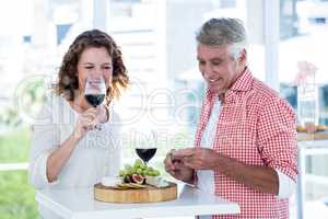 Happy couple at restaurant