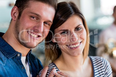 Close-up of smiling couple at restaurant