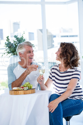 Mature couple enjoying champagne