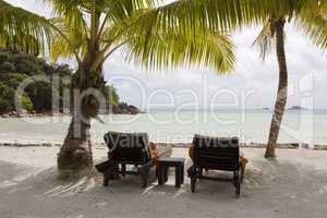 Deckchairs at tropical landscape view, Seychelles