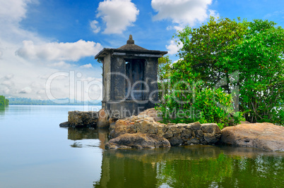 ruined Buddhist temple on a small island