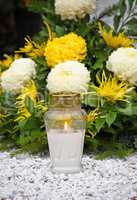 Flowers and votive candle