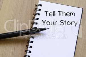 Tell them your story write on notebook