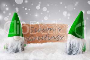Green Gnomes With Card And Snow, Text Seasons Greetings