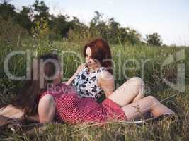 Two young girls on a rest outdoors