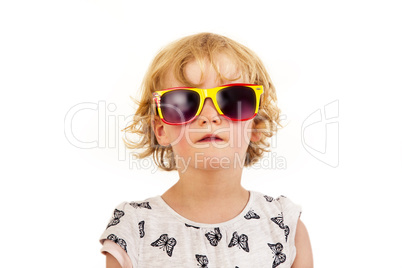 Portrait of a girl with blond hair and sunglasses