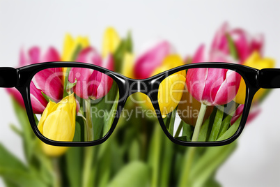 Glasses against natural scenery