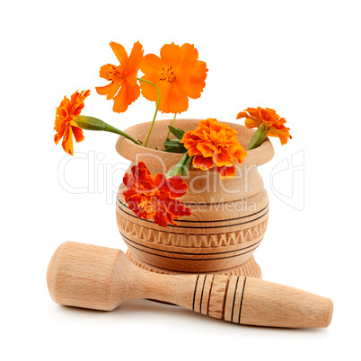 wooden pestle and mortar isolated on white background