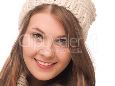 Young happy woman with wool cap and scarf