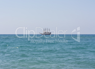 The ship sails at sea photo