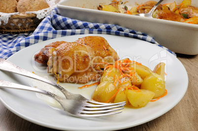 Pieces of chicken with potatoes